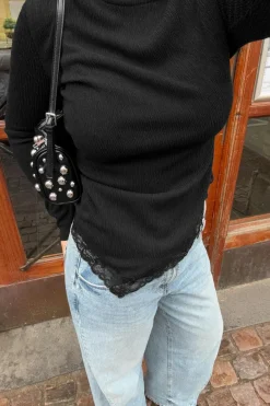 Asymmetric lace detail top
