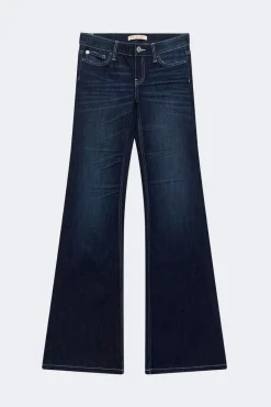 Glow low flare petite jeans