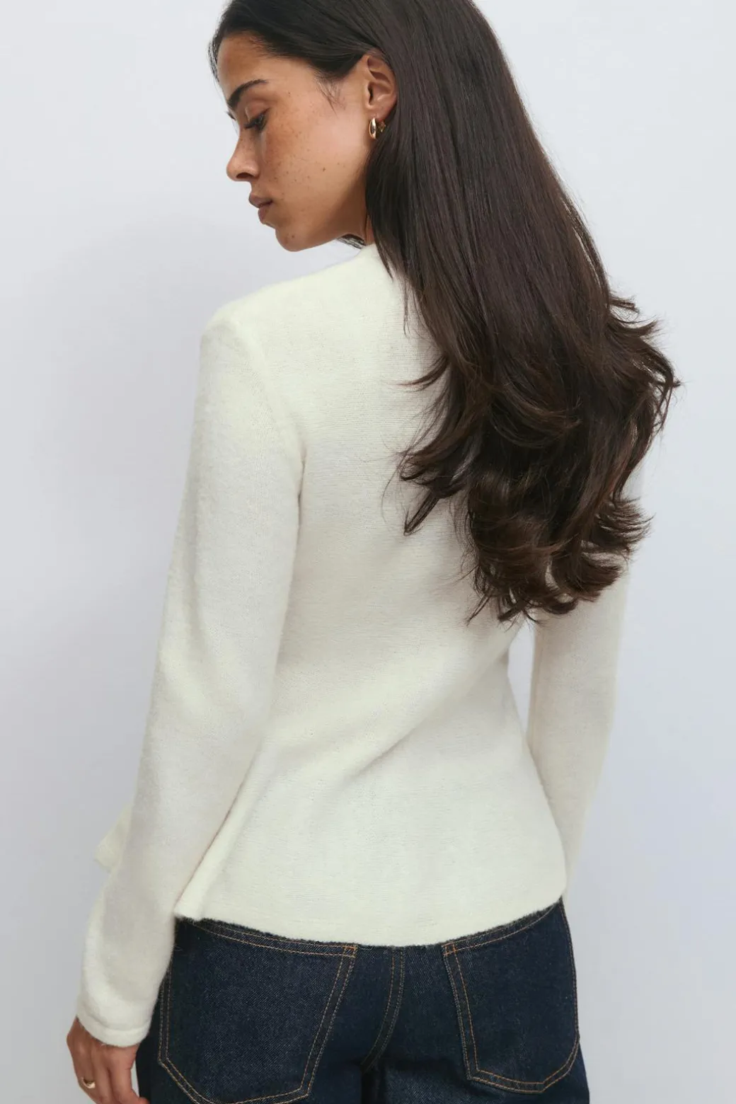 Knitted peplum cardigan