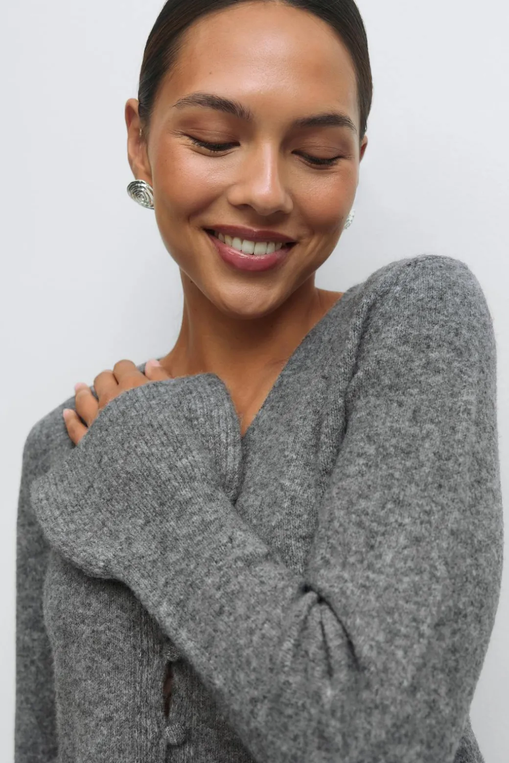 Knitted peplum cardigan