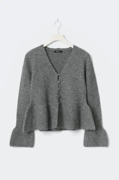Knitted peplum cardigan
