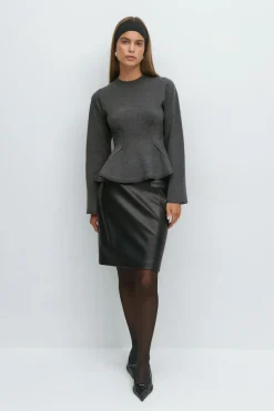 Knitted peplum top