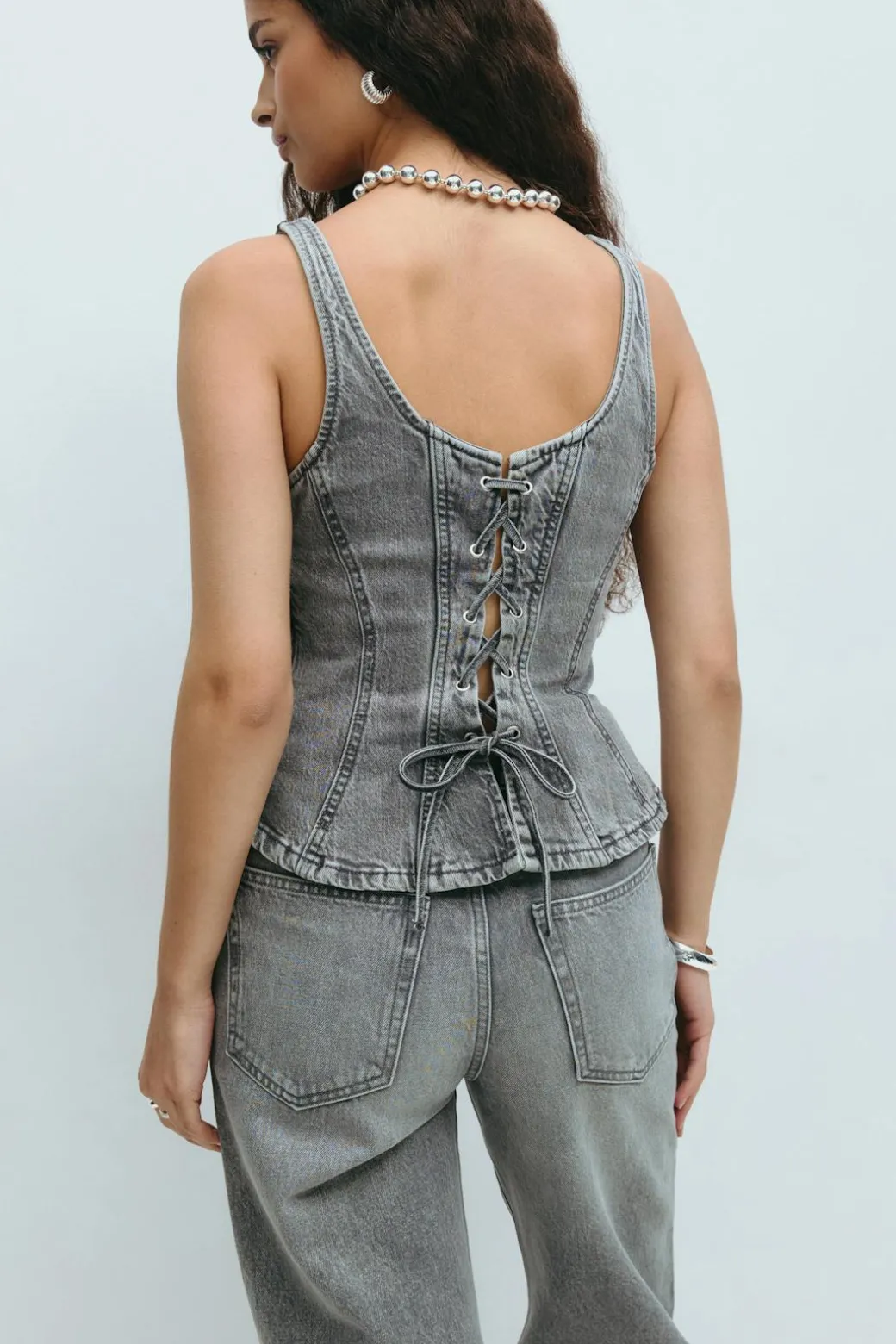 Lacing peplum denim top