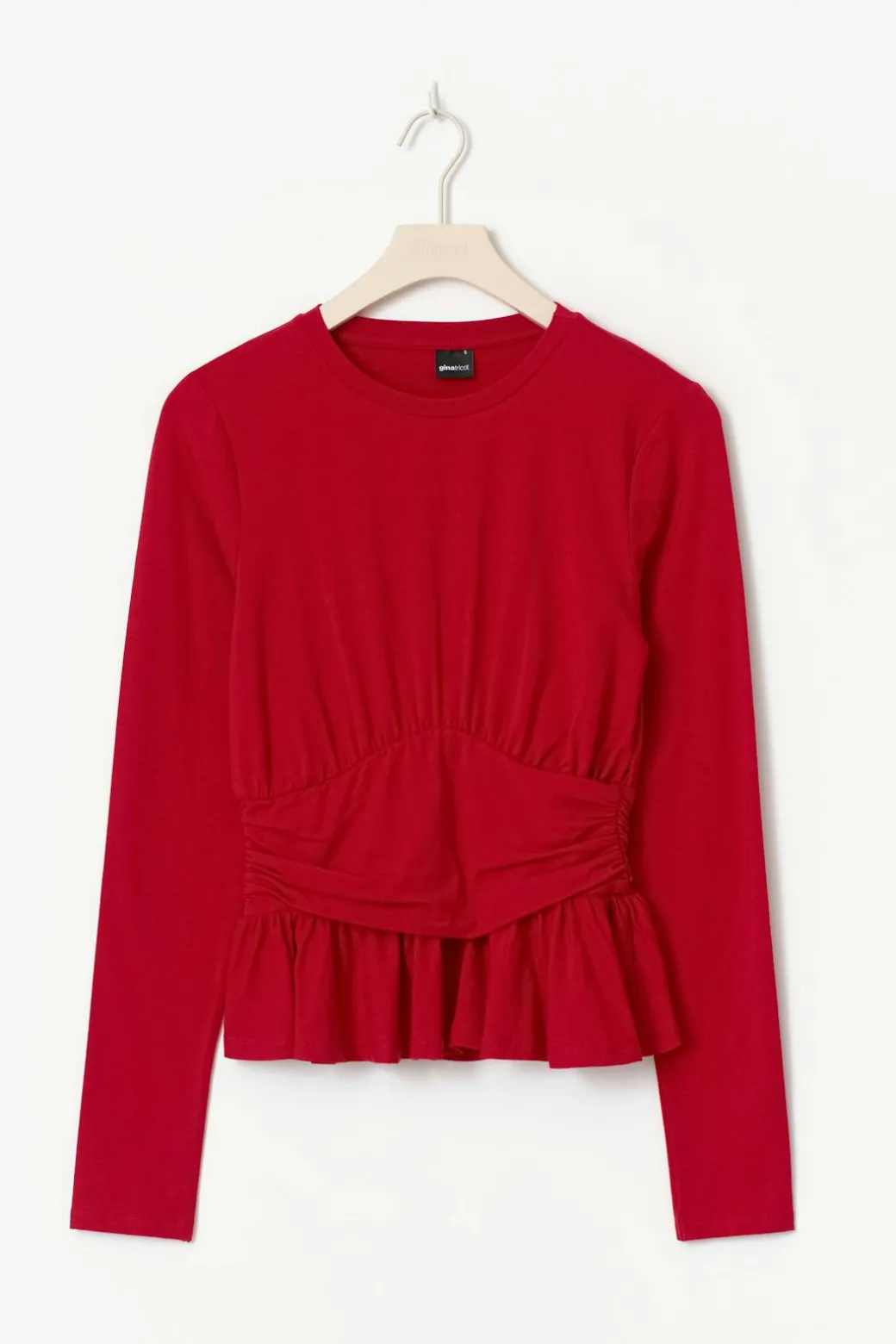 Long sleeve peplum top