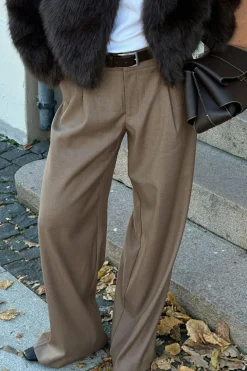 Low wide pleated trousers