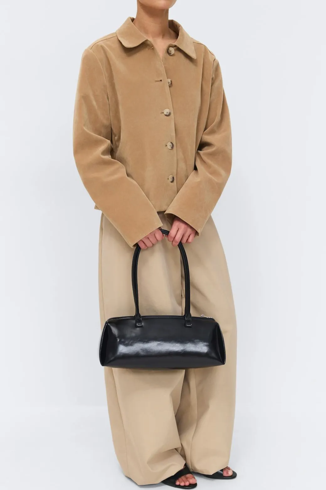 Patent shoulder bag