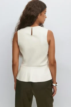 Pu peplum top
