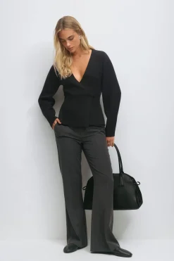 Shaped knitted cardigan