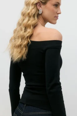Sloped shoulder top