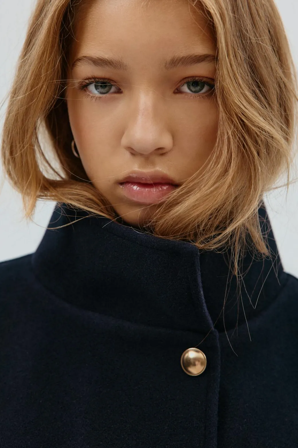 Y belted cape
