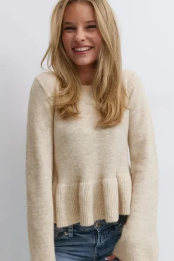 Y knitted peplum sweater